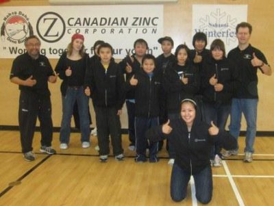 Nahanni badminton team wearing new team jackets